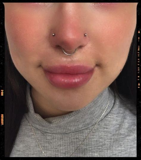 paired nostril piercings|double nostril piercing same side.